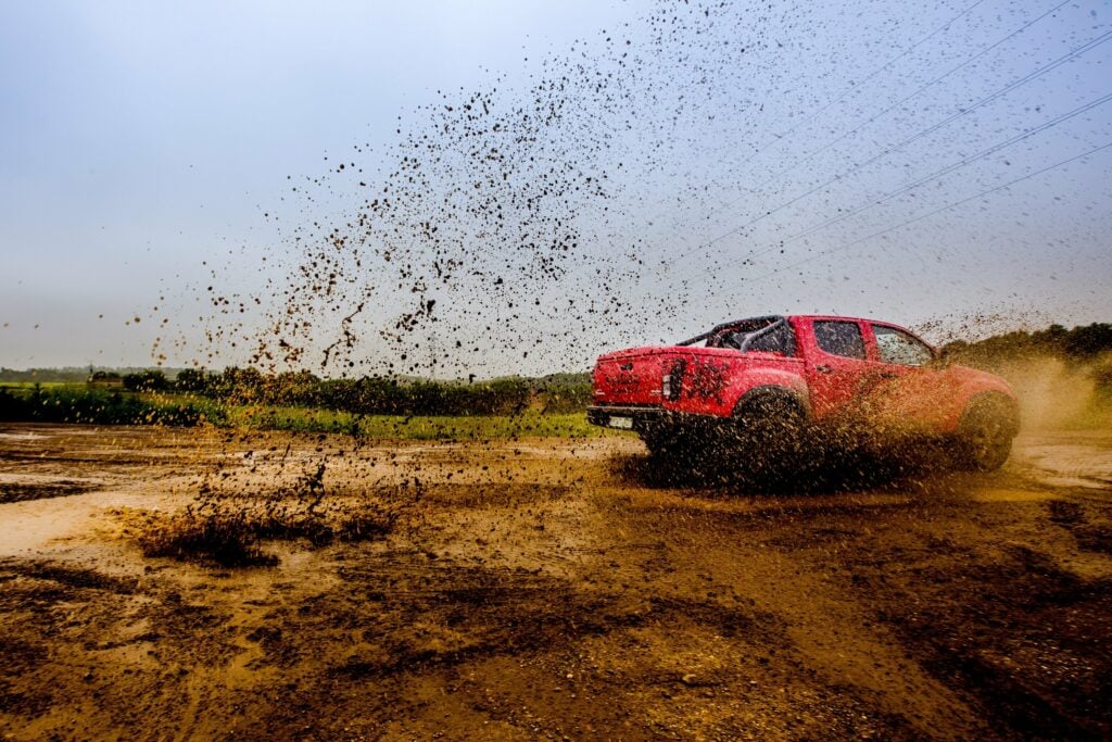 Pickup truck on a muddy road