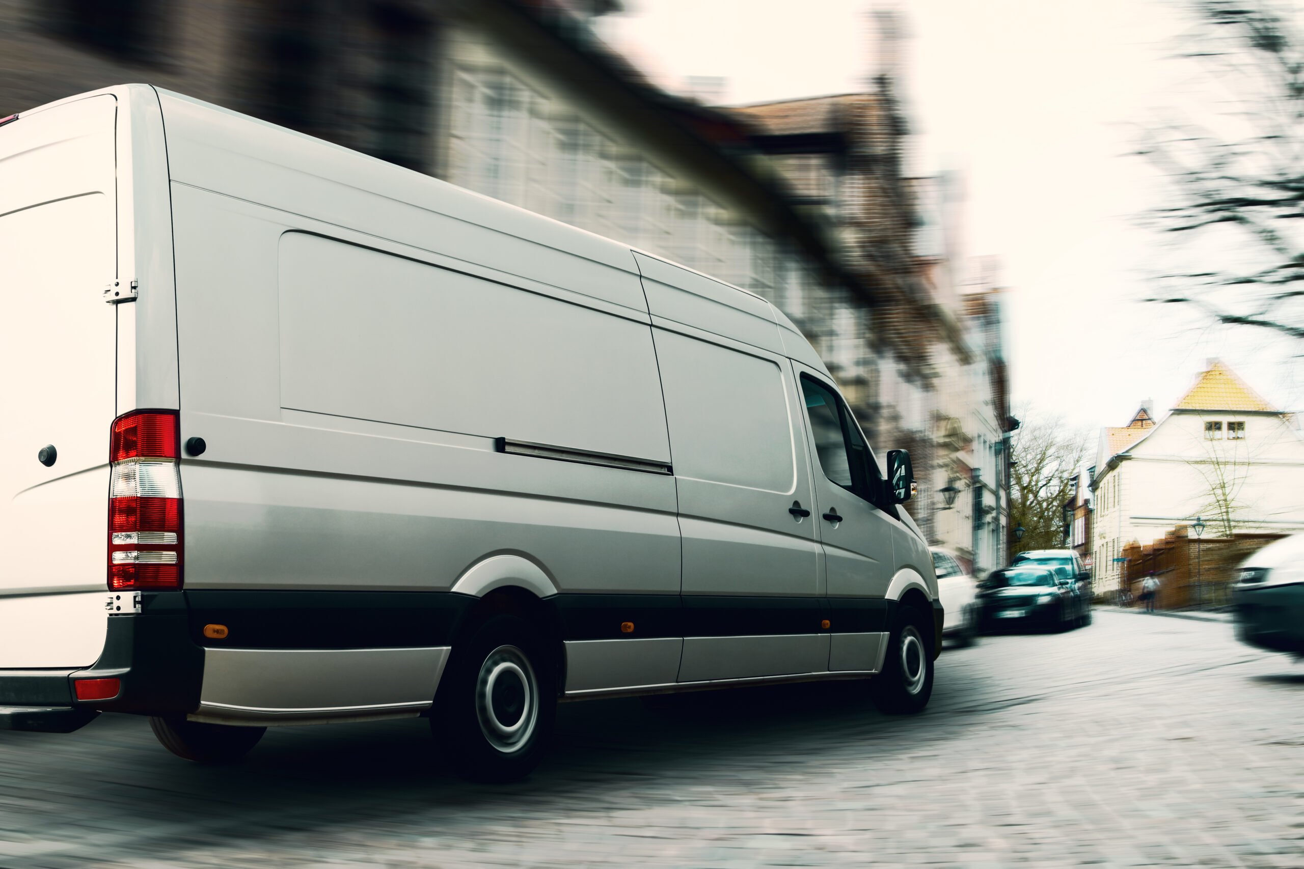 Extra large van driving through the town
