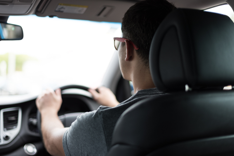 Man driving a vehicle