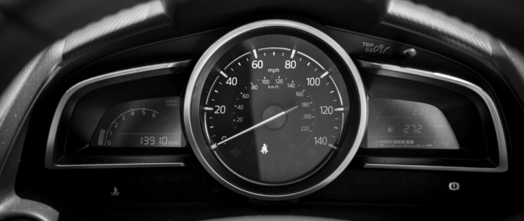 Image of a vehicle odometer measuring mileage on a lease vehicle