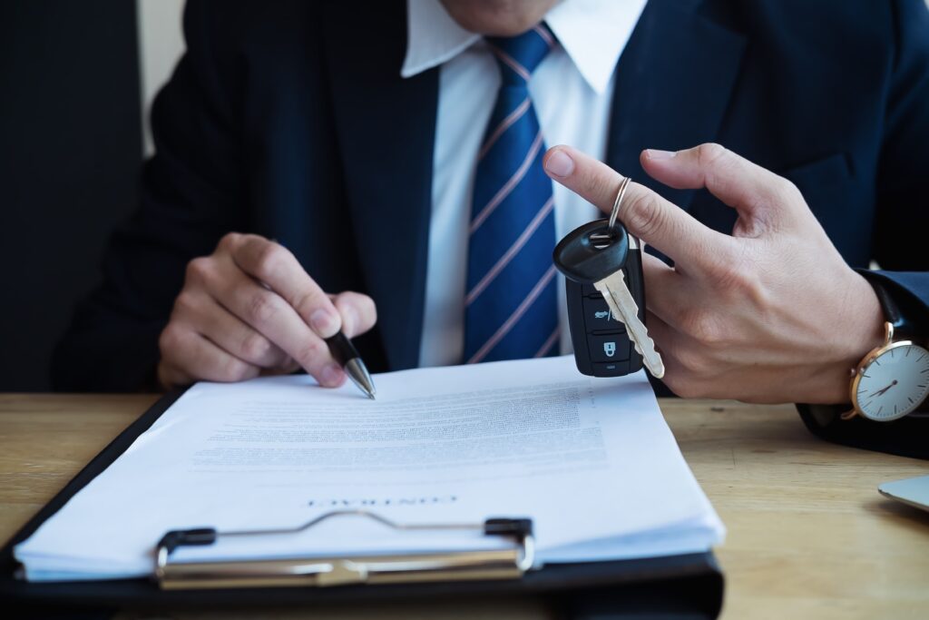 Businessman signing a van leasing contract