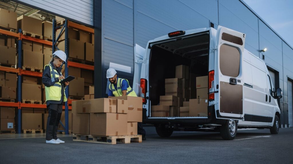 Image of a van being loaded with boxes.