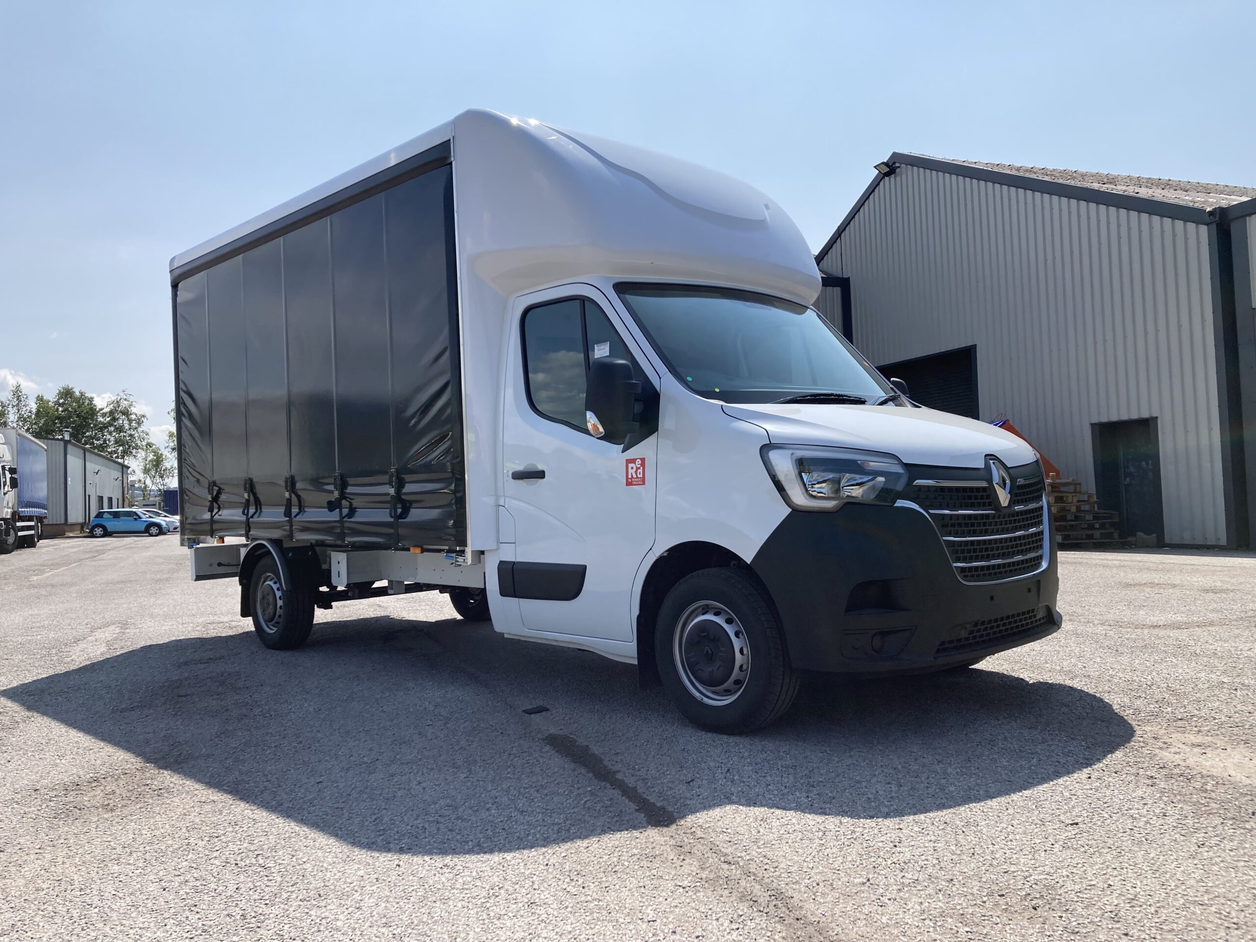 Renault Master curtain side van with black curtains