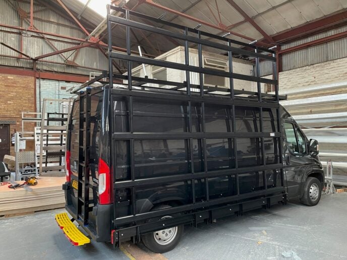 External-glass-racks-for-vans Peugeot Boxer van fitted with external side and roof racks for transporting glass panels and windows